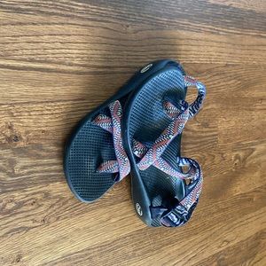 Chacos, Size 9.5, Black Sole, Blue, coral, and yellow pattern straps.
